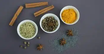 Assorted Spices Near White Ceramic Bowls