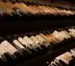 black and white bottles on brown wooden shelf